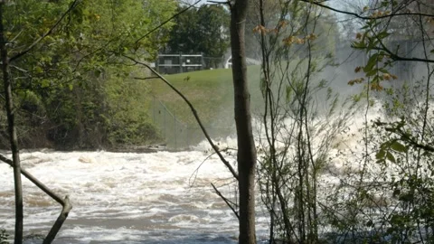 Flooded river water churning after a dam. 4k60p Stock Footage 132509853