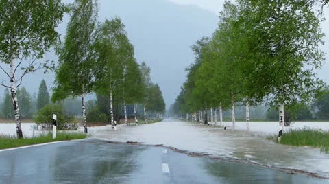 Flooded road in rain Stock Footage 24707218