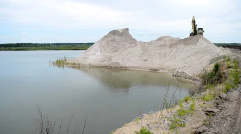 Flooded sand pit in cloudy weather Stock Footage 65957360
