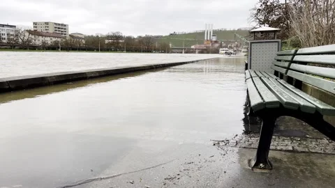 Flooded Sidewalks at a River in Germany Stock Footage 261246349