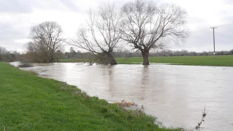 A flooded stream after heavy rain fall Stock Footage 122208294