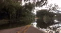 Flooded Street In Florida With Trees And Reflections 4k or 4k+ Resolution