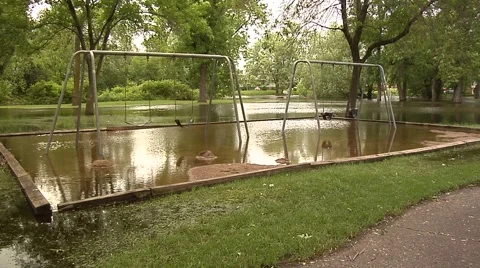 Flooded Swings 1 Stock Footage 40340871