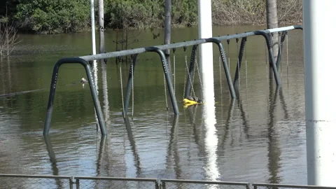 Flooded swingset Stock Footage 265341098