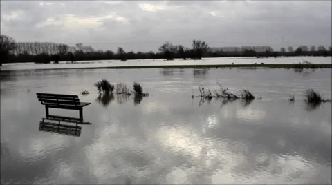 Flooded valley with park bench Stock Footage 28802640