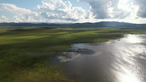 Flooded valley in Pećane, Croatia - Lateral travelling - Aerial 4K Stock Footage 245351380