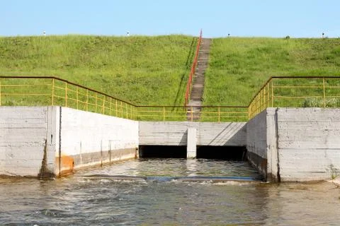 Floodgates of a small dam Stock Photos