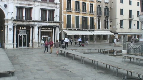 Flooding begins to happen in Piazza San Marco Square in Venice. Stock Footage 155306997