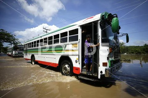 Photograph: Flooding caused by overflow of Grande River in El Salvador ...