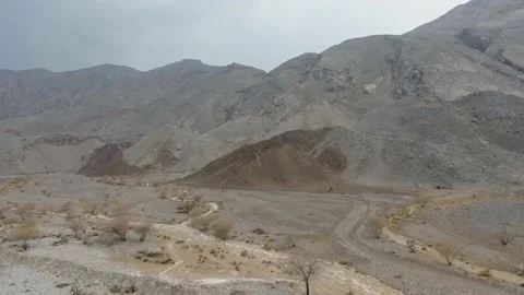 Flooding in a deserted mountainous area, mud flows of water. Saudi Arabia Video stock 106669646
