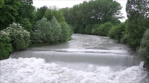 The flooding Dora River flows through a public park in the city of Turin Stock Footage 296173583