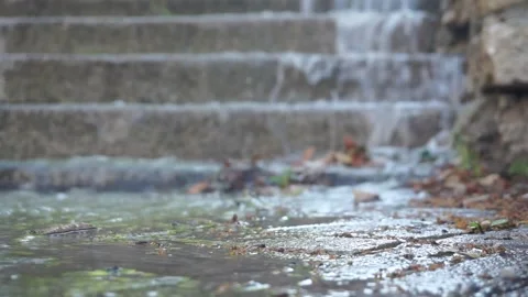 Flooding during rain. Water flows down the stairs Stock Footage 206349795