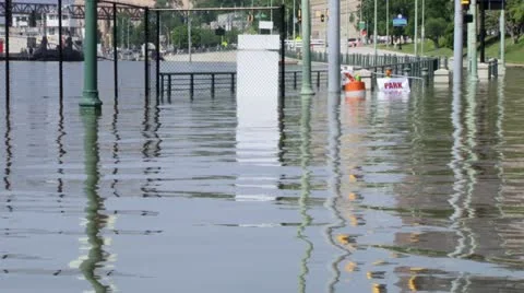 Flooding engulfs an intersection Stock Footage 12575972
