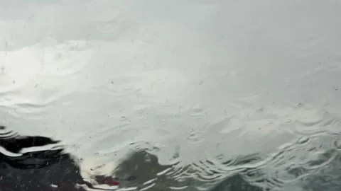 Flooding rain water on a windshield Video stock 337506509