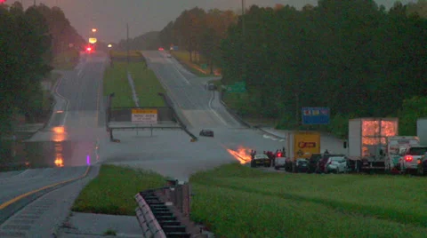 Flooding from record rainfall closes interstate Stock Footage 37783235