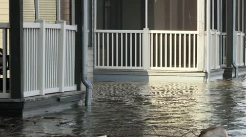 Flooding up to the second floor of a condo complex Stock Footage 12576224
