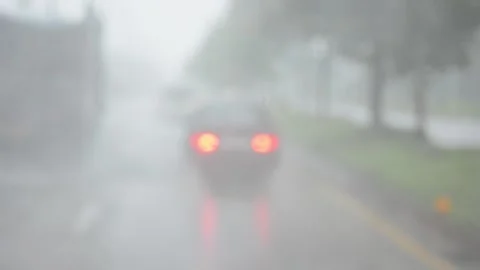 Flooding the traffic surface in defocus. Stock Footage 132375173