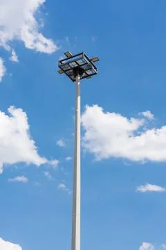 A floodlight with blue sky and clouds Stock Photos