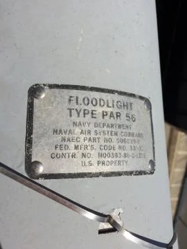 Floodlight type par 56 sign on US Navy ship Stock Photos