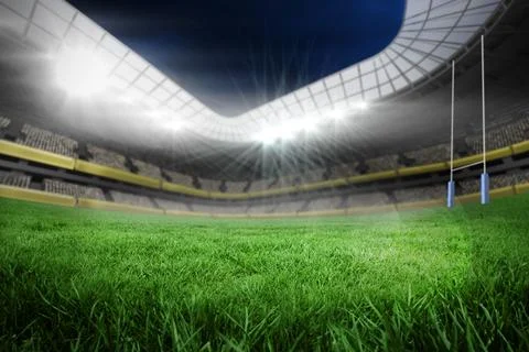 Floodlights lighting empty seats under curved roof as turf covering field with Stock Illustration