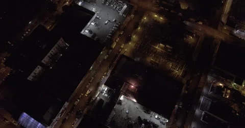 Floodlit lots and an electrical substation after dark Видео 65367873