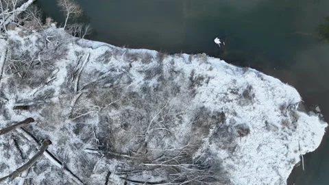 Floodplain river delta winter snow meander drone aerial inland video shot in Vídeo Stock 226435209