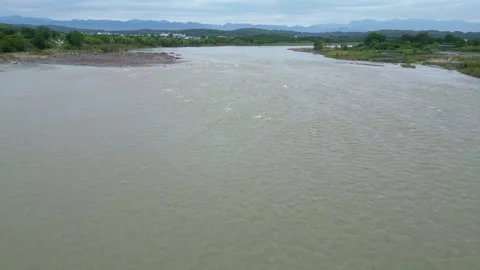 The floods coming down from the upstream during the rainy season Stock Footage 313664998