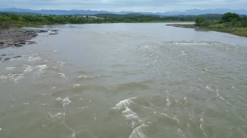 The floods coming down from the upstream during the rainy season Stock Footage 313665458