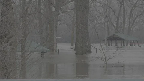 Floodwaters at a park Stock Footage 105426341