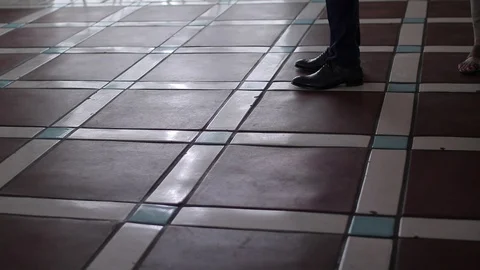 Floor and feet of a man elegantly dressed Stock Footage