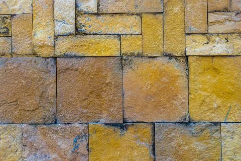 Floor and stone wall texture made of squares and rectangles. Stock Photos