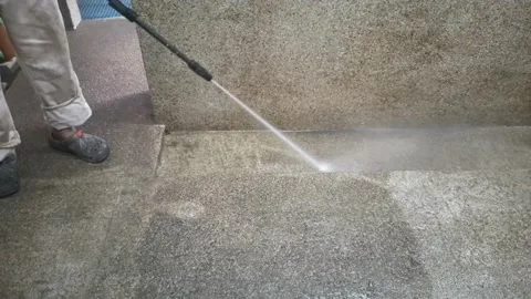 Floor cleaning work is being done using water jets Stock Footage 143950134