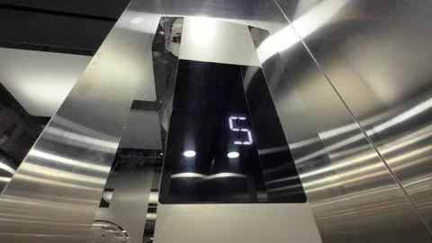 Floor Display Close show numbers going down inside steel shiny elevator Stock Footage 343331189