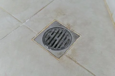 Floor drain in bathroom Stock Photos