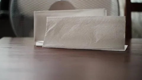 Floor fan blowing tissue paper in slow motion Stock Footage 344692195