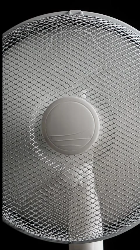 Floor fan spinning on black background loop Stock Footage 341031959