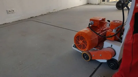 Floor Heating Milling Saw Machine Moving Along with Machine Stock Footage 109107598