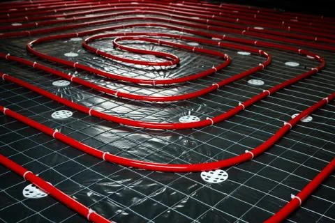 Floor heating pipe. Installation of engineering systems in a building. Stock Photos