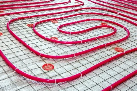 Floor heating pipe. Installation of engineering systems in a building. Stock Photos