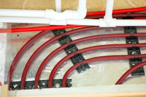 Floor heating pipe. Installation of engineering systems in a building. Stock Photos