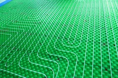 The floor heating system - installation Stock Photos