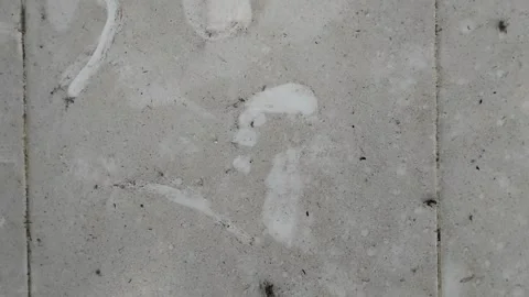 The floor of the house is made of white ceramic which is dirty and full of dust Видео 308057268