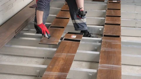 Floor installation work glue repair house framework. Repair home construction of Video stock 169977720