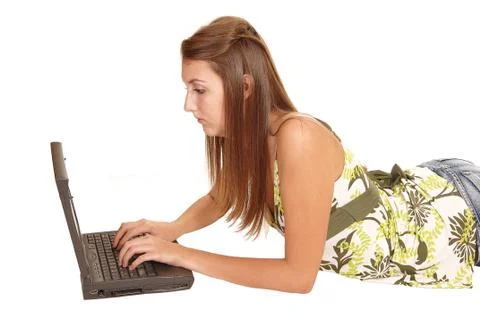 On floor with laptop. Stock Photos