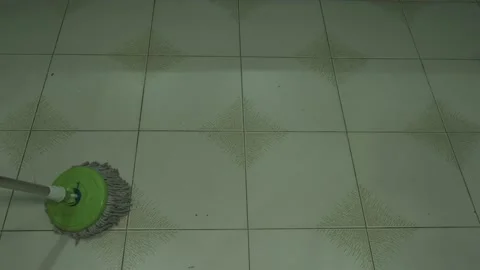 Floor mopping using easy spin mop Stock Footage 137982547