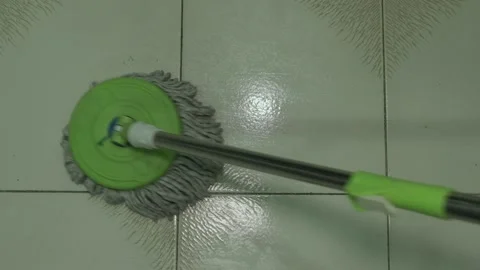 Floor mopping using easy spin mop Stock Footage 137982633
