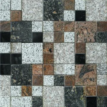 Floor mosaics consisting of different size cubes of black, white and brown color Stock Photos
