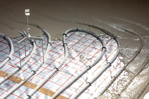 Floor plumber heating system, underfloor plumber heating concept, a building Фото
