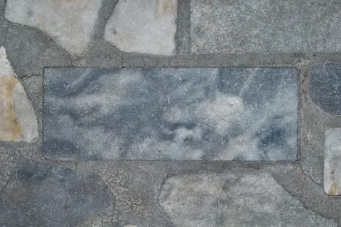 The floor surface is made of marble or granite tiles. Stock Photos