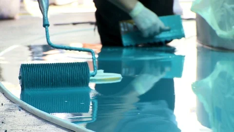 Floor surface painting with roller and epoxy resin paint 3 Stock Footage 123725148